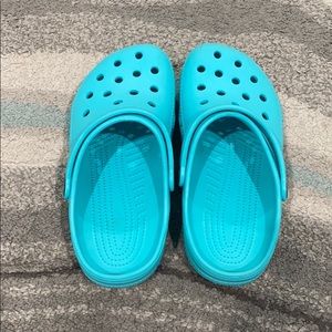 Teal crocs
